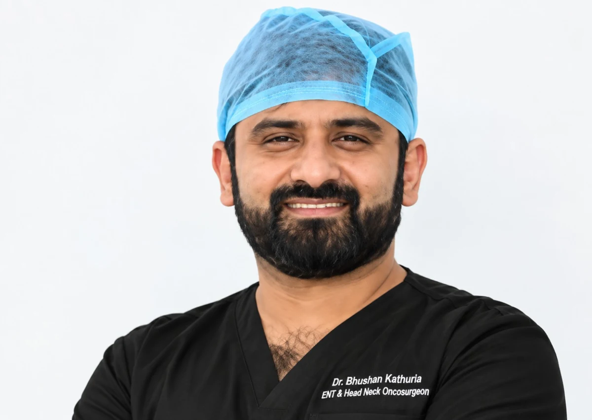 Dr Bhushan Kathuria in surgical scrubs